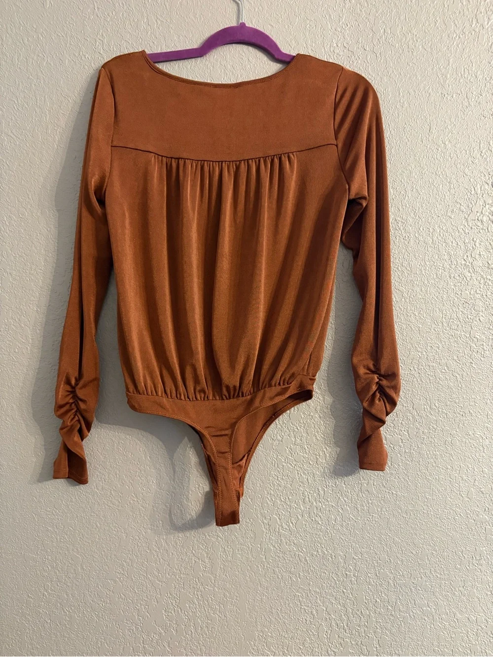Free People Long-Sleeve Bodysuit in Brown Rust Color